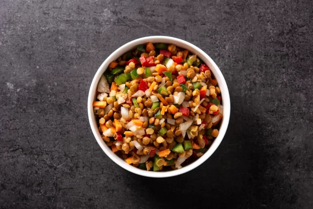 Chickpea And Quinoa Bowl With Roasted Red Pepper Sauce